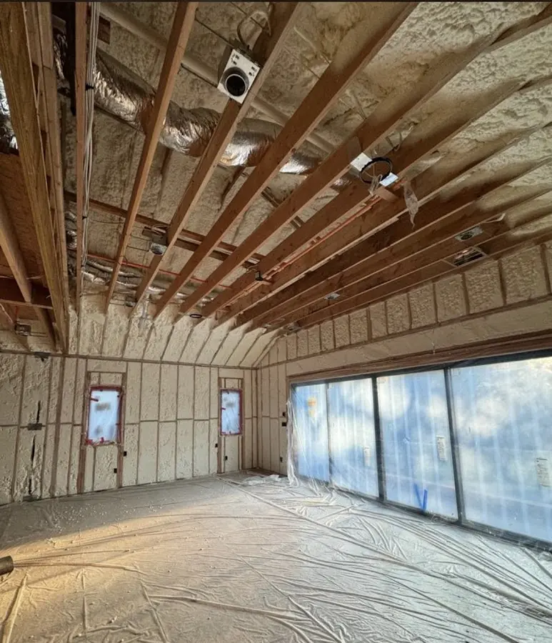Interior walls and ceiling insulated with spray foam during new construction in Big Bear Lake